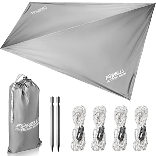 Foxelli Hammock Rain Fly - Waterproof Hammock Tarp, 12ft Lightweight Backpacking Tarp, Portable Camping Tarp Shelter with Included Extra Long Guy Lines & Stakes
