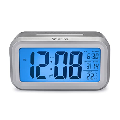 Westclox Travel Alarm Clock with Large Digital Display and Blue Backlight on Demand, Alarm Clock, Month/Date and Temperature Display with Ascending 5 Minute Snooze Alarm, Silver
