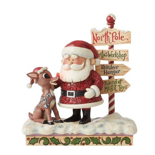 Enesco Jim Shore Rudolph The Red-Nosed Reindeer and Santa Next to North Pole Directional Sign Figurine, 7.68 Inch, Multicolor