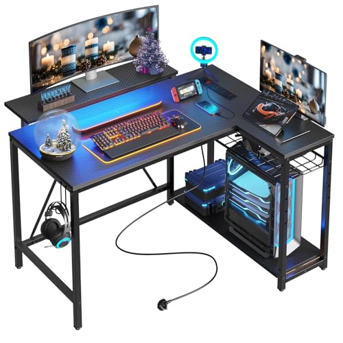 Bestier Small Gaming Desk with Power Outlets,42 L Shaped LED Computer Desk with Monitor Stand Reversible Storage Shelves,Corner Gamer Desk with Headset Hooks USB Charging Port,Carbon Fiber Black
