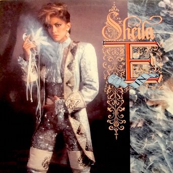 Sheila E in Romance 1600 (Original Inner Sleeve w/ Lyrics) Songs: Sister Fate. Dear Michaelangelo. A Love Bizarre. Toy Box. Yellow. Romance 1600. Bedtime Story. Merci for The Speed of a Mad Clown in Summer