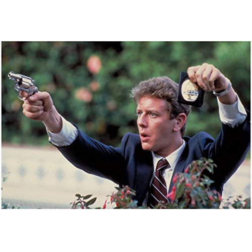 Judge Reinhold 8 Inch x 10 Inch Photo Beverly Hill Cop The Santa Clause Fast Times at Ridgemont High Holding Up Gun & Badge kn